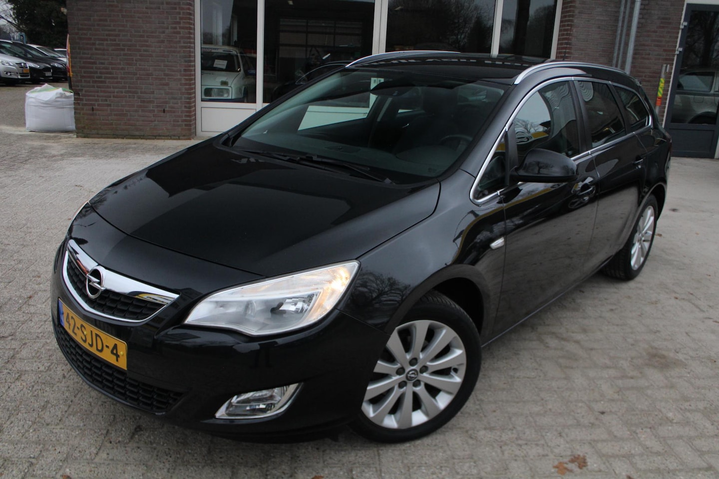 Opel Astra - Sports 1.4 Cruise control,  Half-leder, ECC, Boordcomputer, Elektrische ramen, 17" LMV - AutoWereld.nl