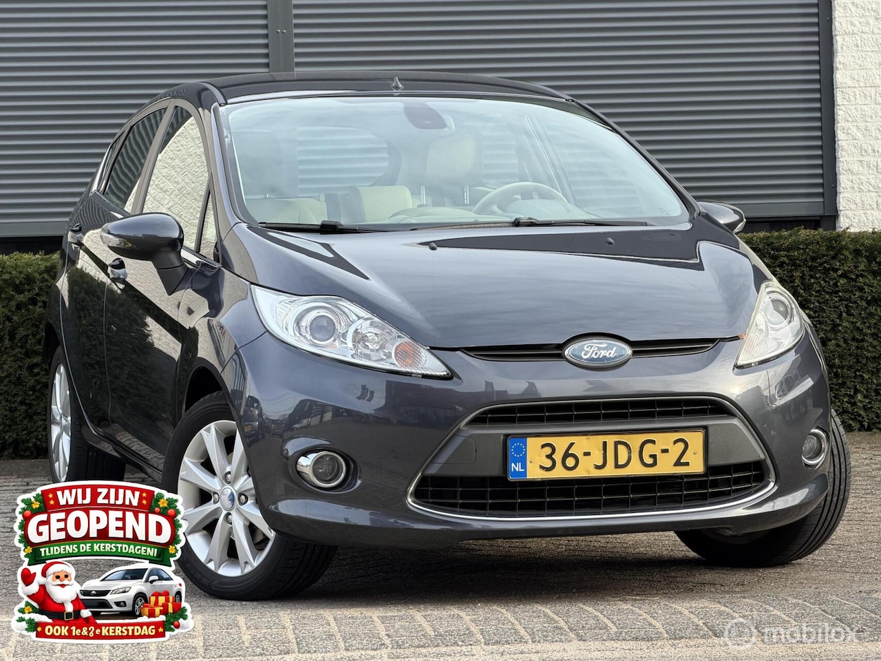 Ford Fiesta - 1.25 Ghia|NAP|APK|AIRCO|ELEKPAKKET - AutoWereld.nl