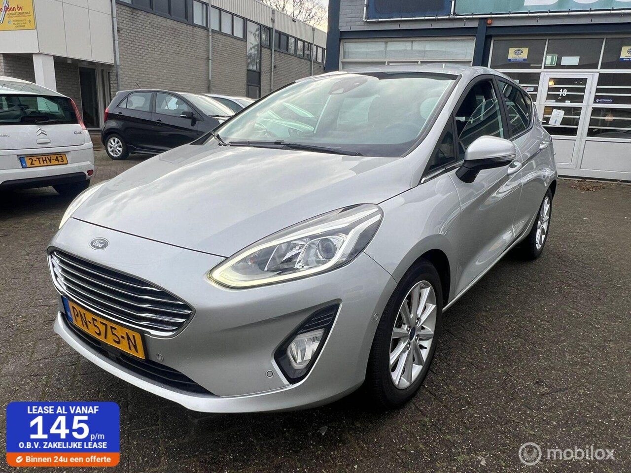 Ford Fiesta - 1.0 EcoBoost Titanium / B&O / Navigatie - AutoWereld.nl