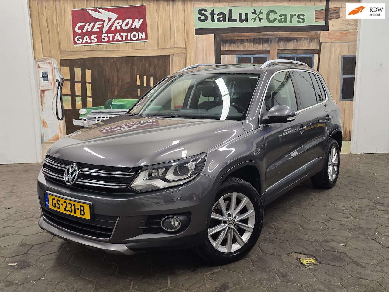Volkswagen Tiguan - 2.0 TSI Sport&Style 4Motion/CRUISE/BOEKJES - AutoWereld.nl