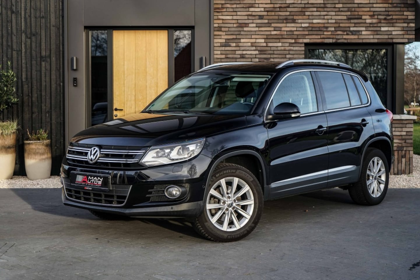 Volkswagen Tiguan - 2.0TSI 4Motion Sport & Style 180PK Trekhaak 2200KG - AutoWereld.nl