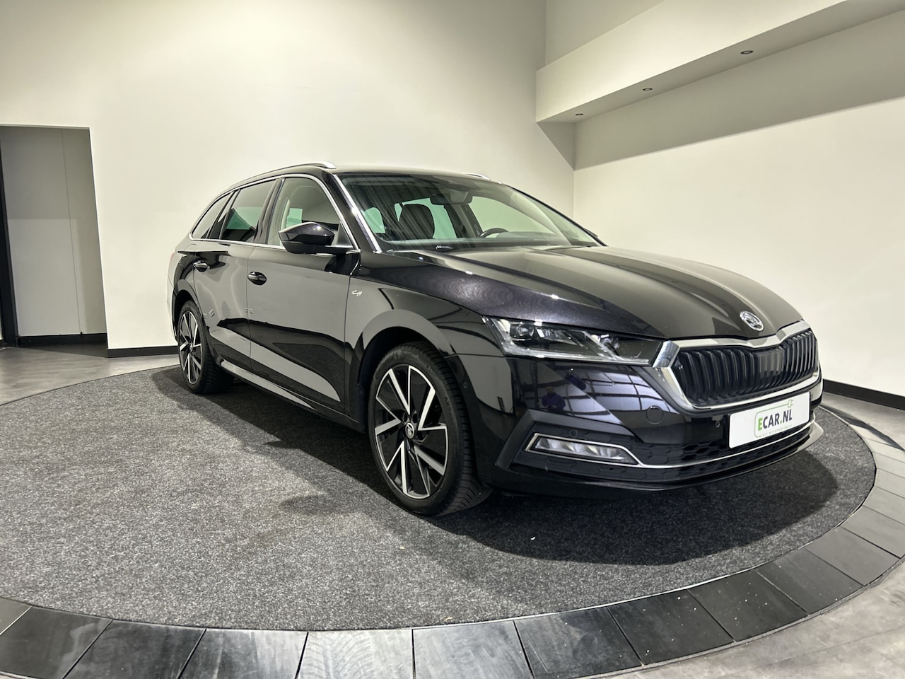 Skoda Octavia Combi - 1.4 TSI iV PHEV Business Edition Plus Nette Auto | Trekhaak | Elektrisch verstelbare stoel - AutoWereld.nl