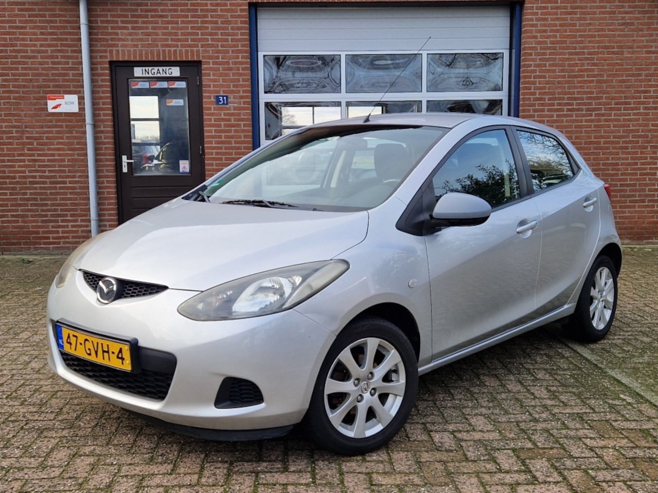 Mazda 2 - 1.3 S-VT Touring 5-drs NL-auto Airco 1-eig. L.m.v. Stoelverw. - AutoWereld.nl