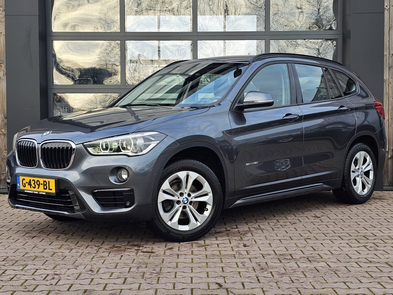 BMW X1 - sDrive18i Centennial High Executive | Automaat | LED | Trekhaak | Stoelverwarming | Navi | - AutoWereld.nl