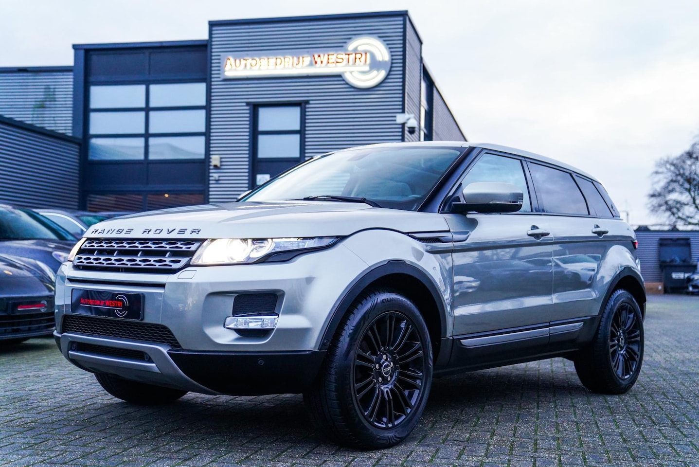 Land Rover Range Rover Evoque - 2.0 Si 4WD Prestige | Meridian Sound System | Stuurwielverwarming | Stoelverwarming | Trek - AutoWereld.nl