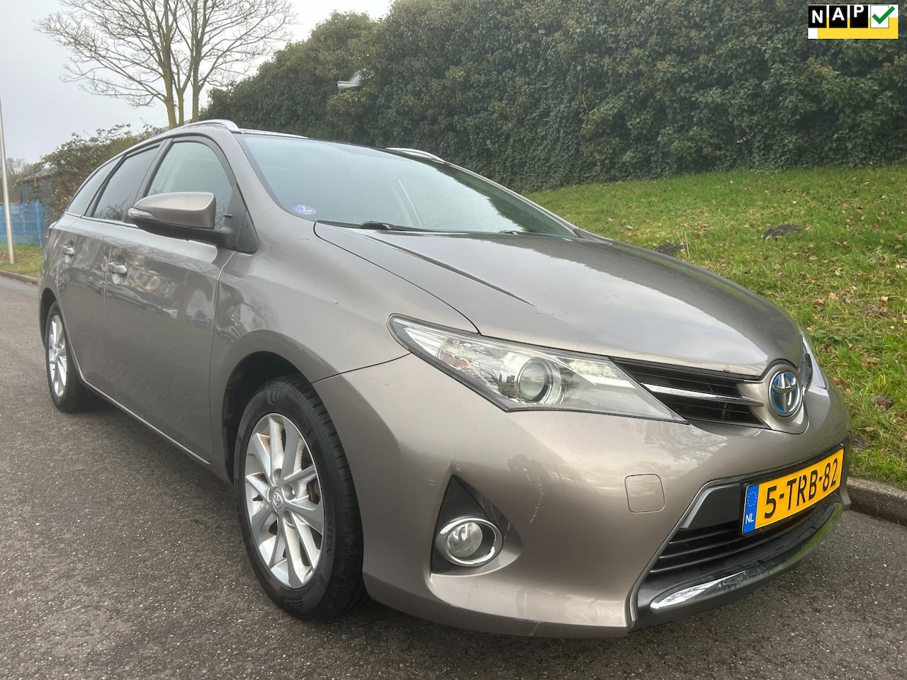 Toyota Auris Touring Sports - 1.8 Hybrid Lease - Pano - Navi - Camera - Cruise - AutoWereld.nl