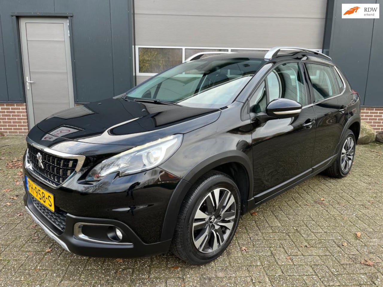 Peugeot 2008 - 1.2 PureTech Allure-Navigatie-Clima-LM-NAP! - AutoWereld.nl