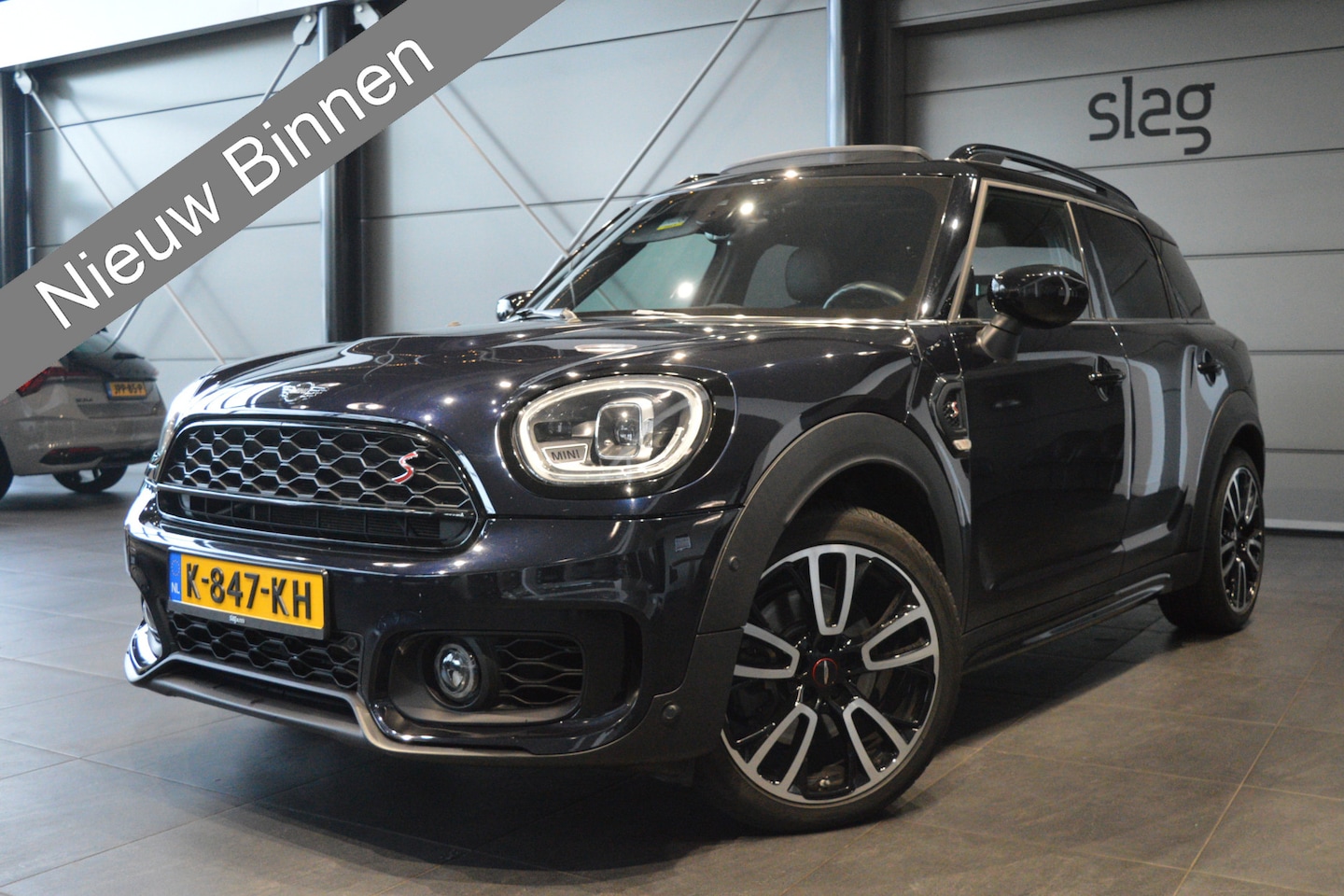 MINI Countryman - 2.0 Cooper S Hammersmith pano leer camera 19 inch !! - AutoWereld.nl