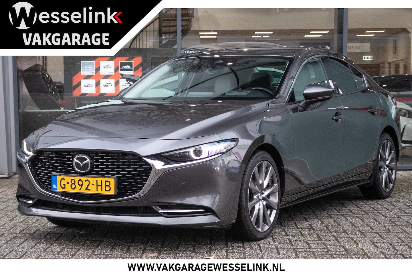 Mazda 3 - 2.0 e-SkyActiv-X M Hybrid 180 Luxury - Leder | Navi | Adap. cruise - AutoWereld.nl