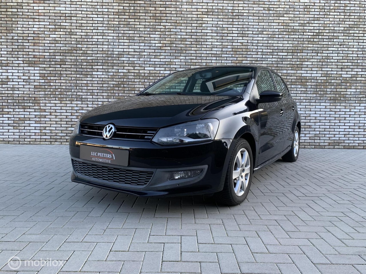 Volkswagen Polo - 1.2 5DRS/NAVI/STOELVERWARMING/105000KM! - AutoWereld.nl