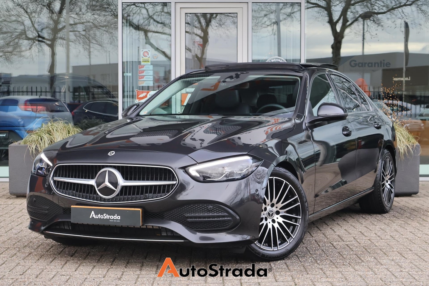 Mercedes-Benz C-klasse - C180 Luxury Line | Pano | Sfeer | Carplay | Cruise | Climate | Navigatie | Camera - AutoWereld.nl