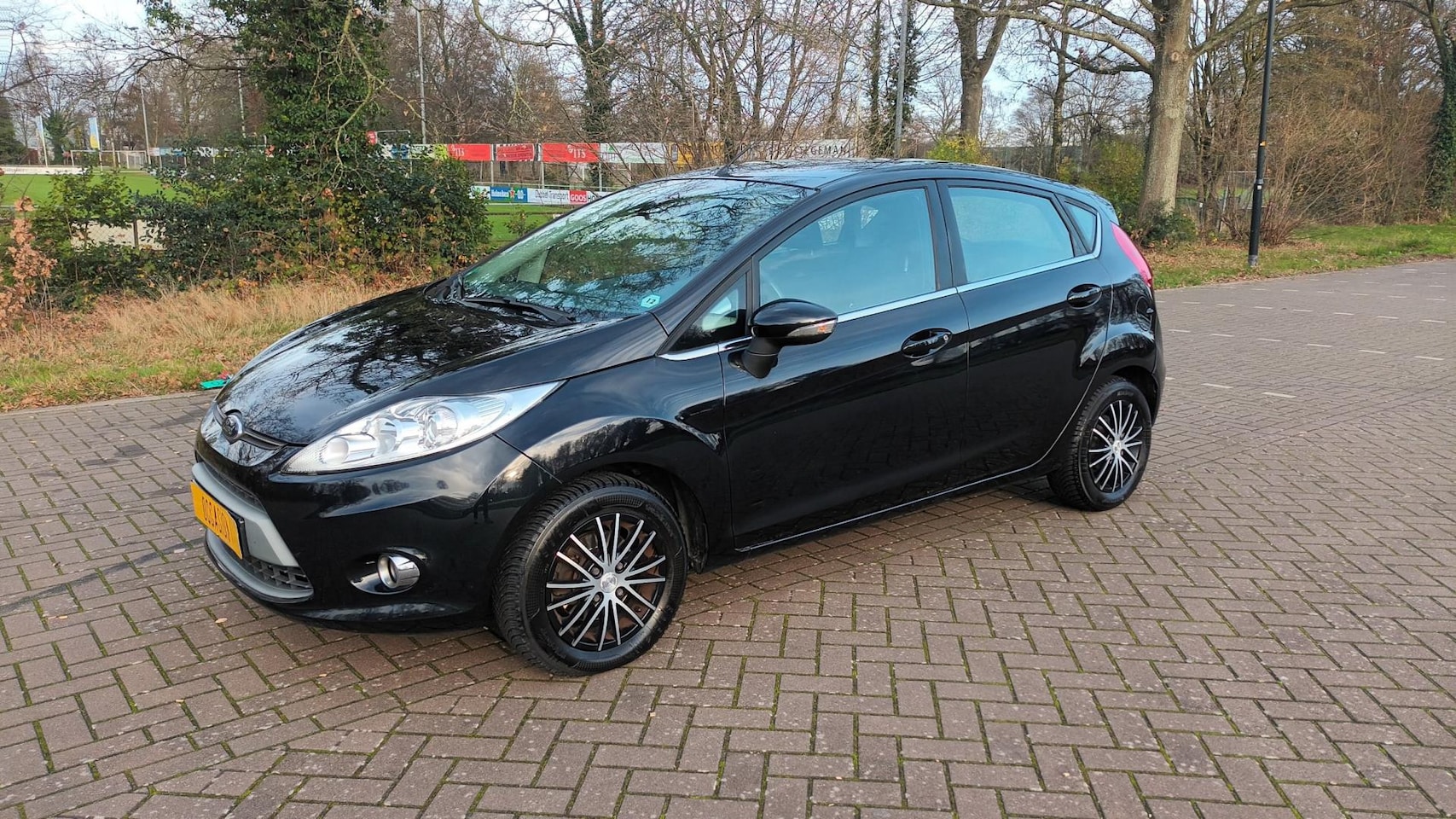 Ford Fiesta - 1.4 Titanium Airco / Stoelverwarming - AutoWereld.nl