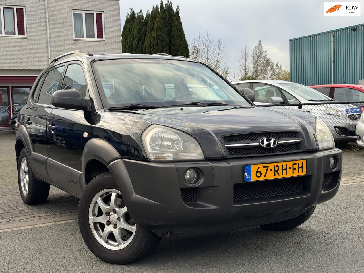 Hyundai Tucson - 2.0i Active MOTOR ROOKT - AutoWereld.nl