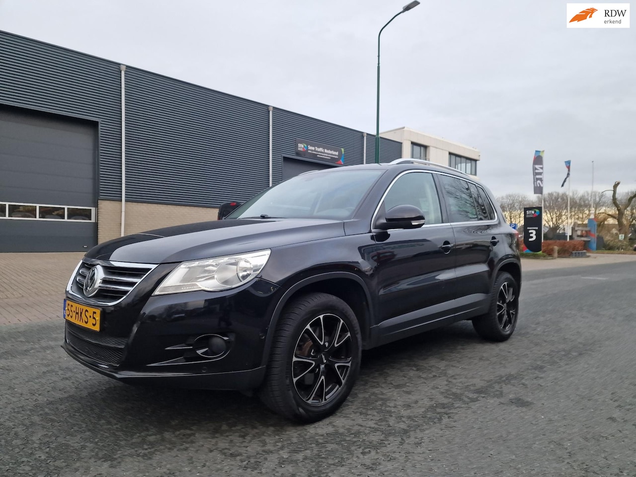 Volkswagen Tiguan - 1.4 TSI Sport&Style NAVI PSENSOR CRUISE TREKHAAK 2 X SLEUTELS - AutoWereld.nl