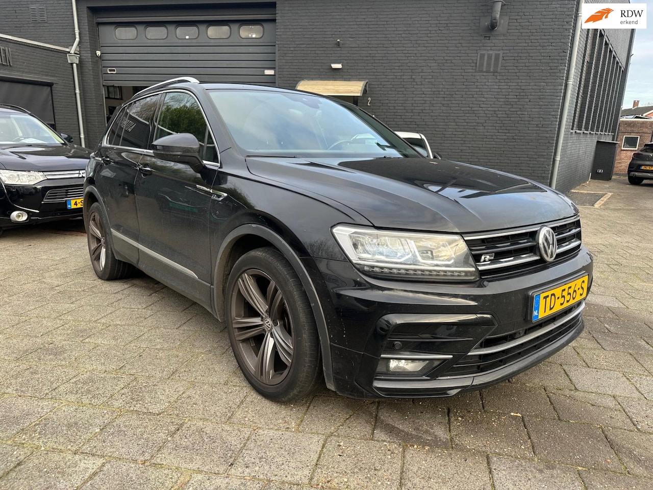 Volkswagen Tiguan - 1.4 TSI Comfortline Business R 1.4 TSI (125pk) Comfortline Business R! Navigatie! - AutoWereld.nl