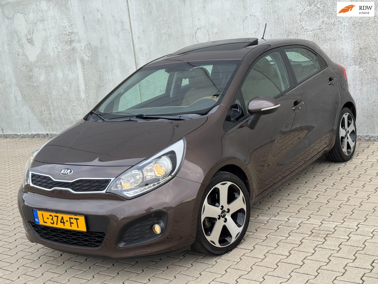Kia Rio - 1.4 CVVT SuperPack Schuifdak Clima Stoelverw PDC Stuurverw - AutoWereld.nl