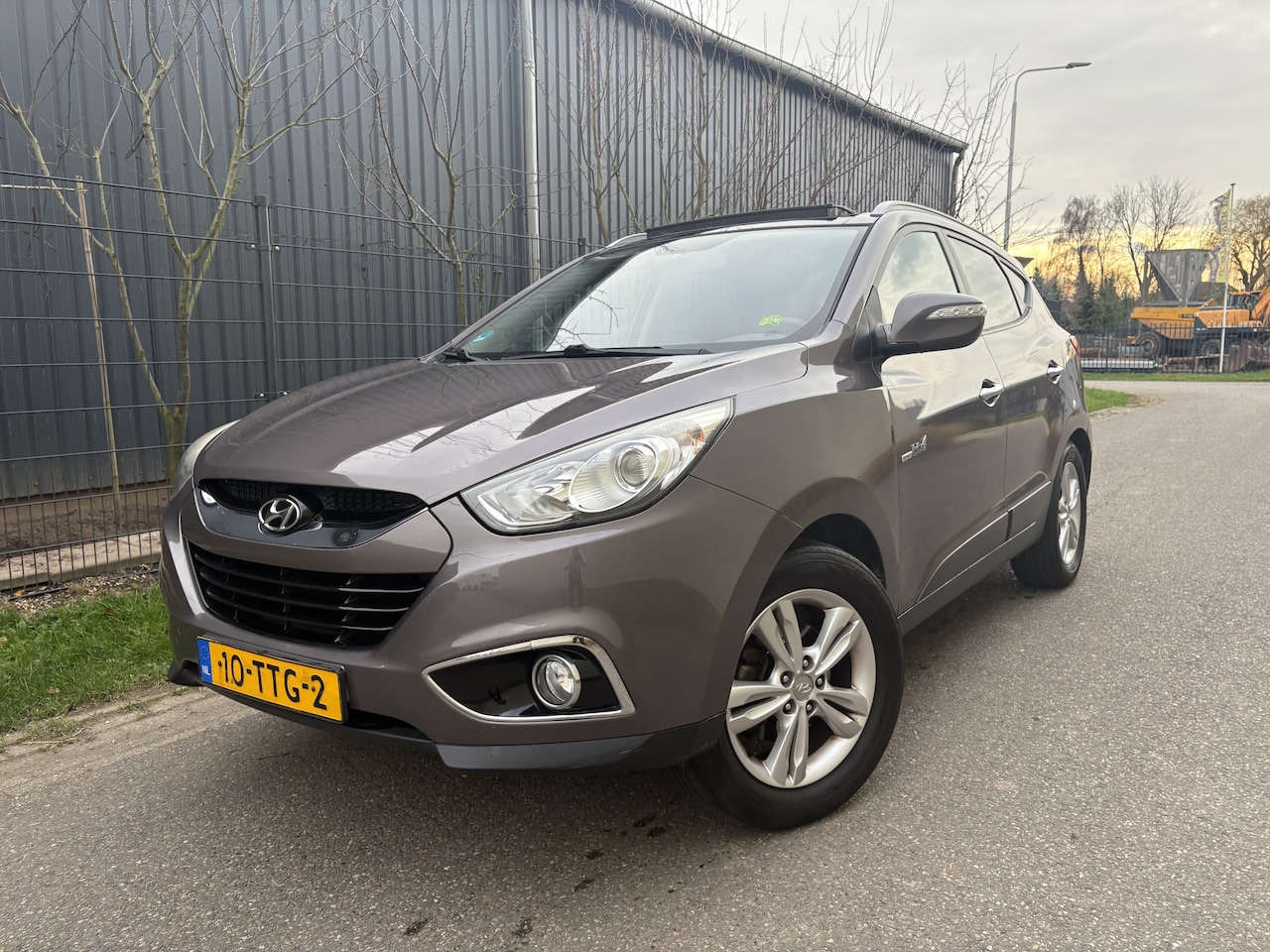 Hyundai ix35 - 1.6i GDI i-Light / NAVI / AIRCO / PANORAMADAK - AutoWereld.nl