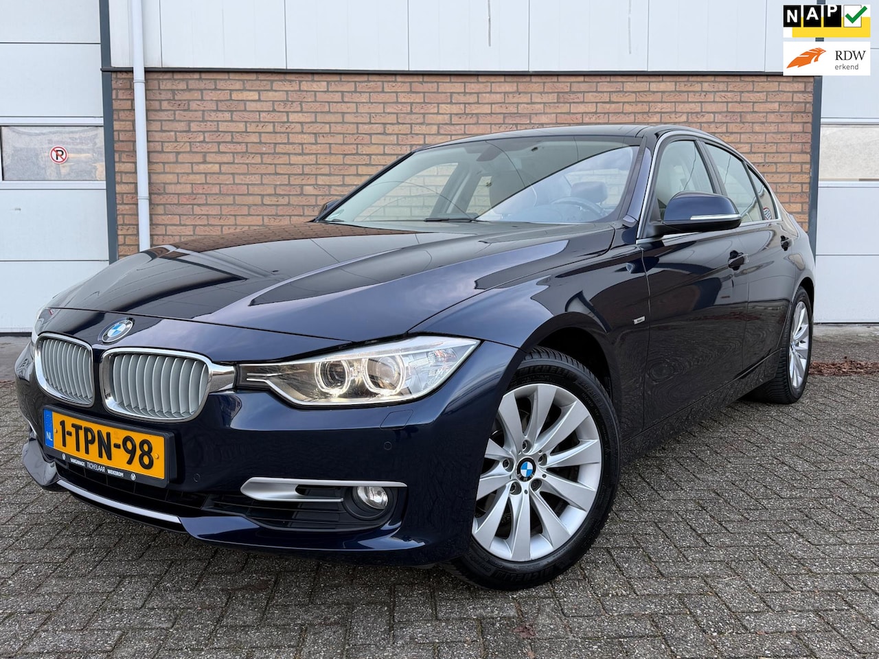 BMW 3-serie - 320i Executive LEDER/NAVI/TREKHAAK/NL AUTO !!! - AutoWereld.nl