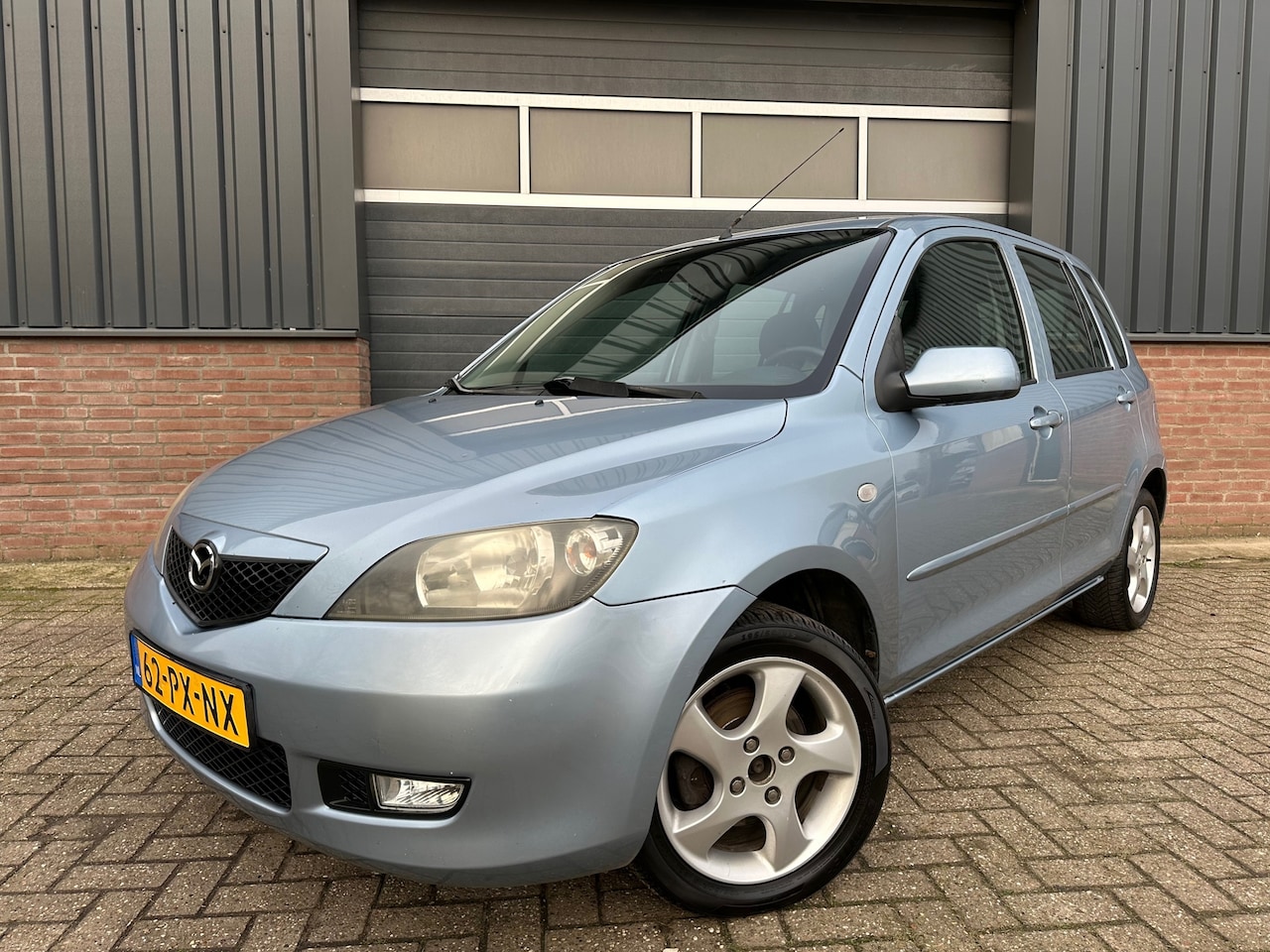 Mazda 2 - 1.4 Exclusive Trekhaak, Airco - AutoWereld.nl