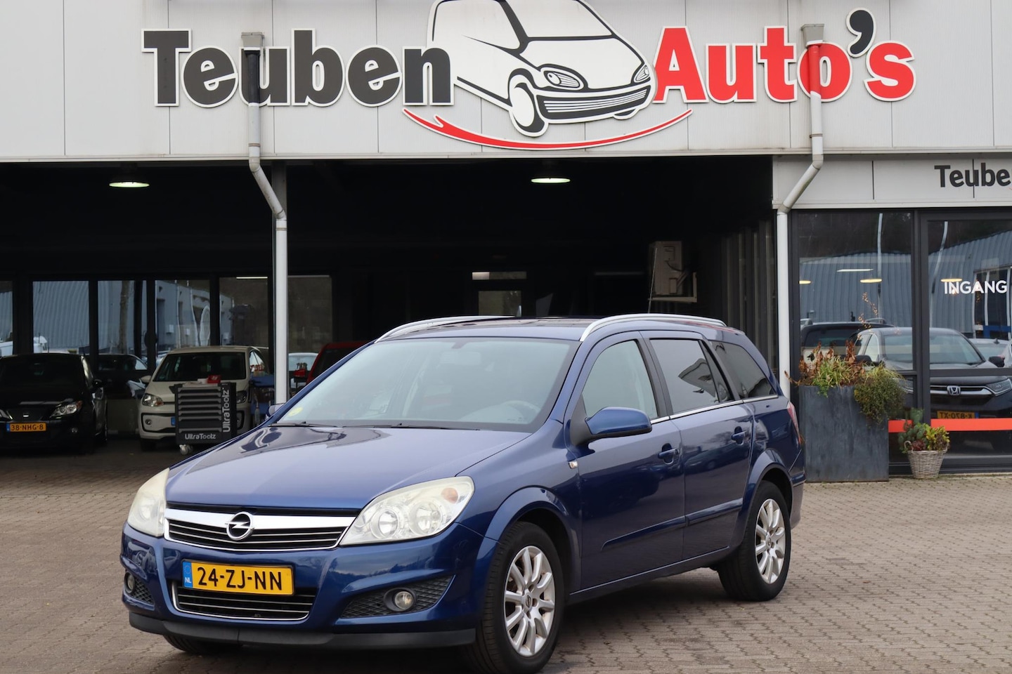Opel Astra Wagon - 1.6 Temptation Airco, Cruise control, Elektrische ramen, Trekhaak - AutoWereld.nl