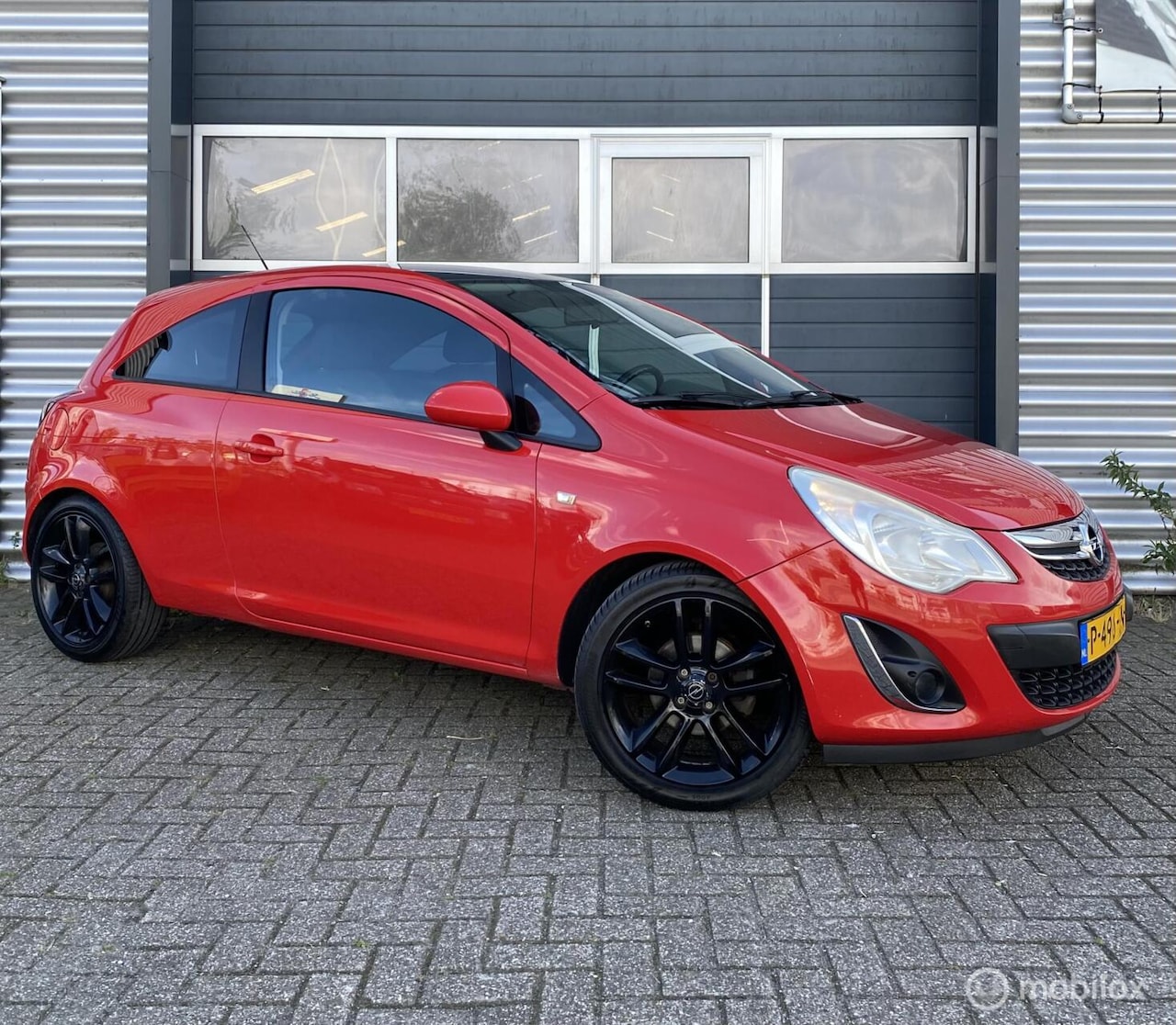 Opel Corsa - 1.2 Colour Edition 2011|Sport|17 Inch|Zwart Dak| - AutoWereld.nl