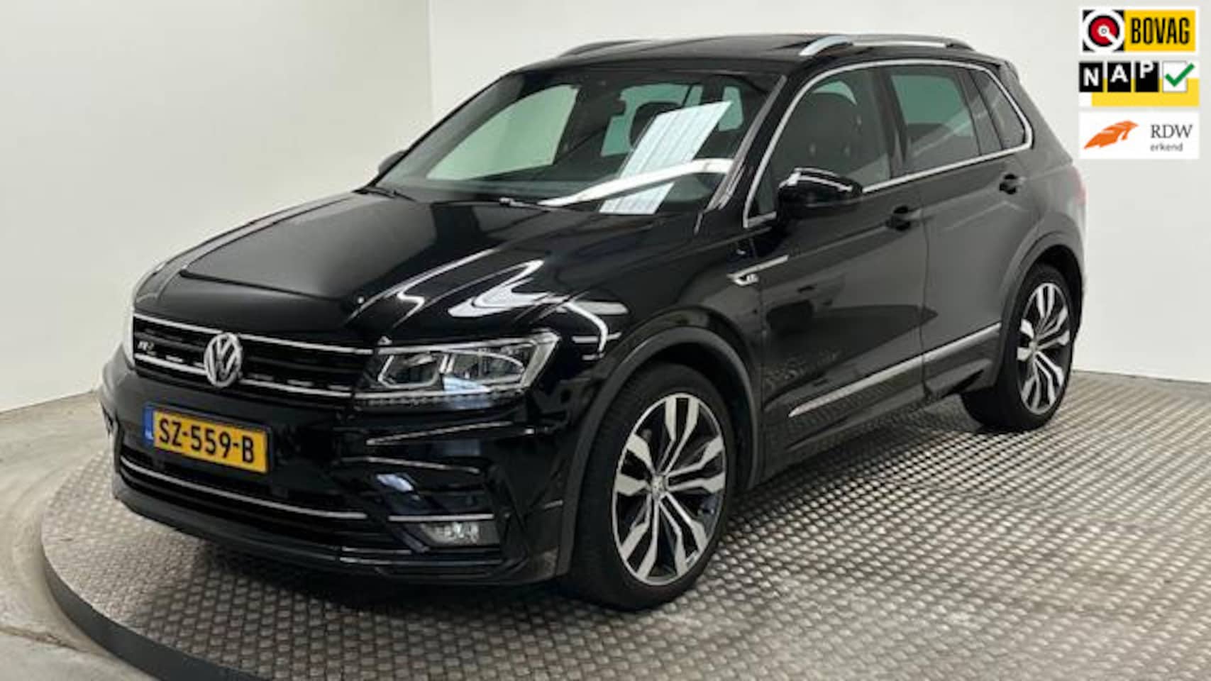 Volkswagen Tiguan - 1.4 TSI 4Motion R-Line automaat benzine navigatie stoelverwarming carplay andriod panorama - AutoWereld.nl