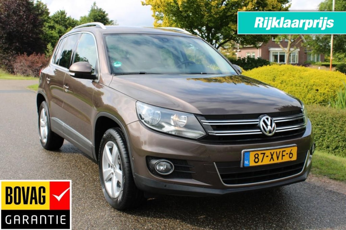 Volkswagen Tiguan - 1.4 TSI SportenStyle 122pk ECC/Cruise/Park Ass/Navi/Alcantara/Trekhaak - AutoWereld.nl