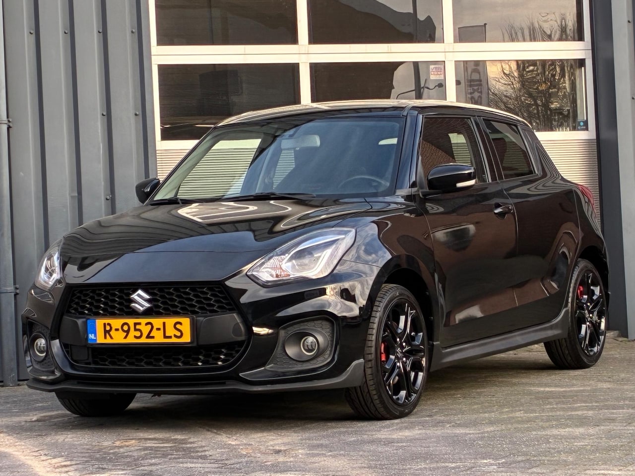 Suzuki Swift - 1.4 Sport Clima Navi Cruise Camera Stoelverwarming - AutoWereld.nl
