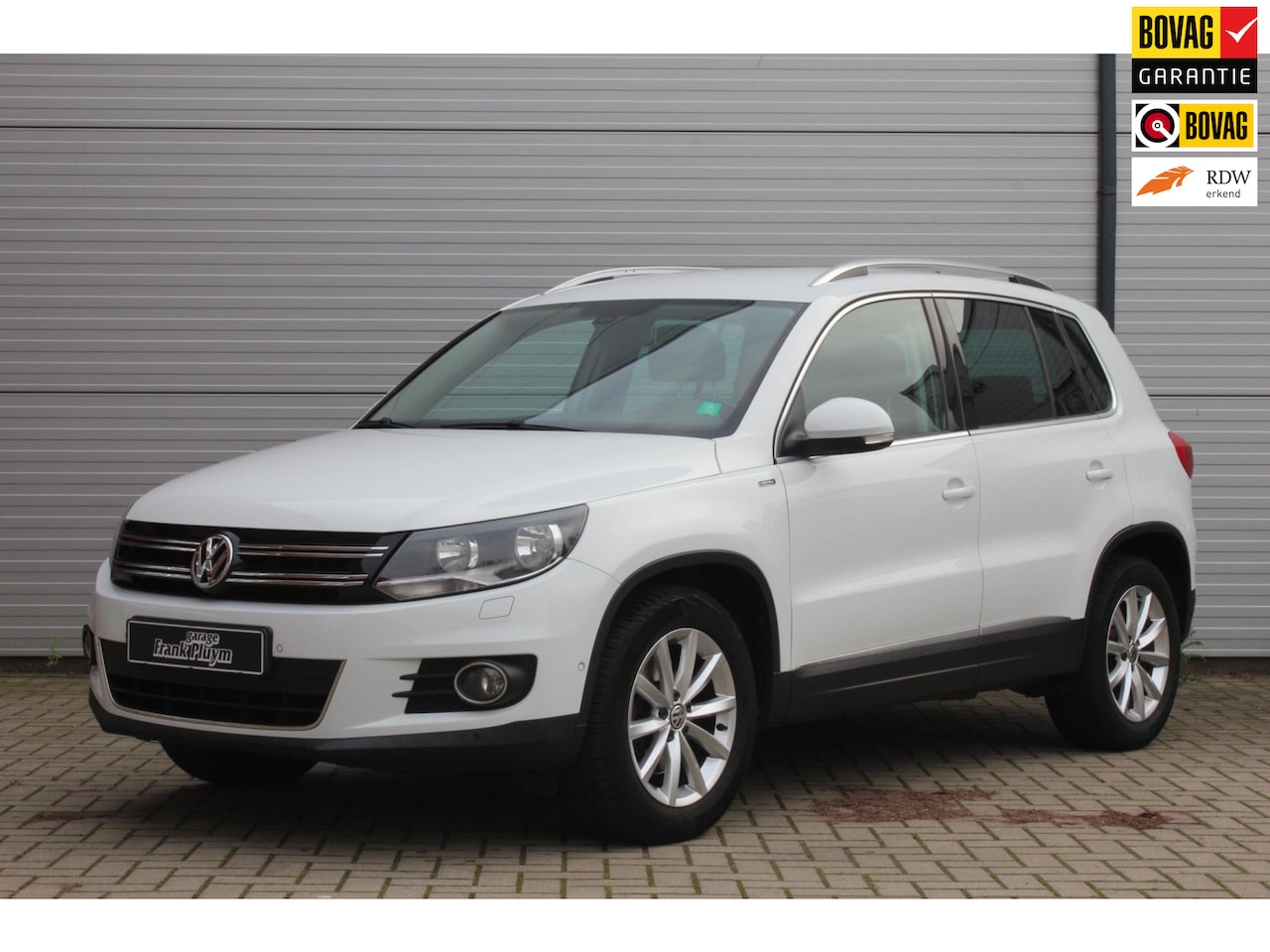 Volkswagen Tiguan - 1.4 TSI Sport&Style DSG/Trekhaak/4-Seizoensbanden - AutoWereld.nl