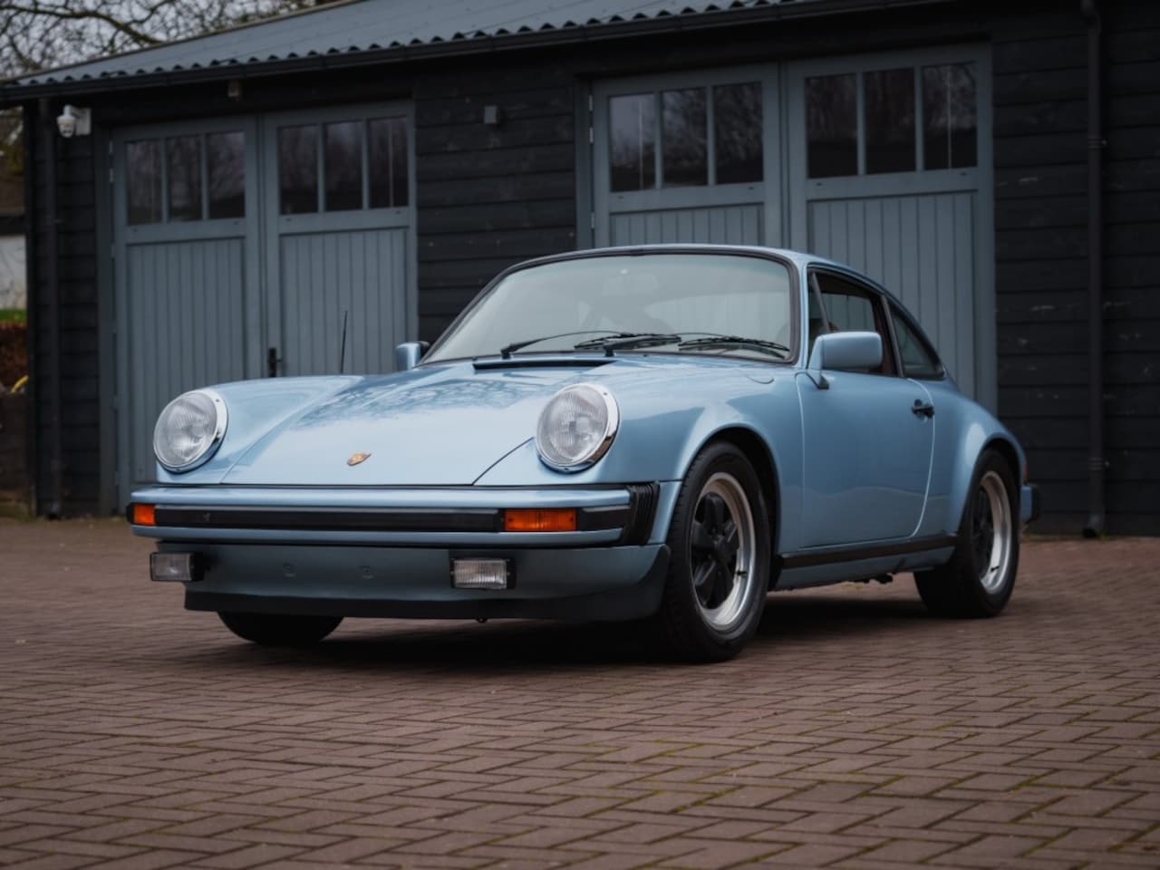 Porsche 911 - SC Coupe Hell blue Metallic - AutoWereld.nl