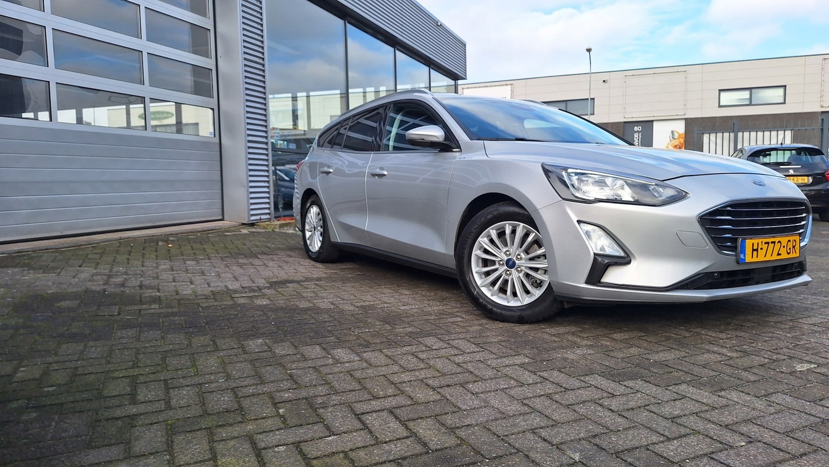 Ford Focus Wagon - 1.0 EcoBoost Titanium Bus Automaat/Nav/Cruise/Lm/Enz* - AutoWereld.nl