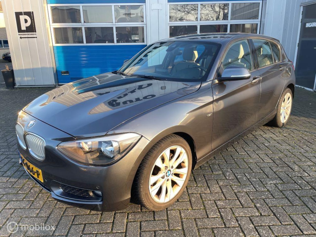 BMW 1-serie - 116i Urban-Line 5D NAVI-Cruise-17''-Dakje-Pdc - AutoWereld.nl
