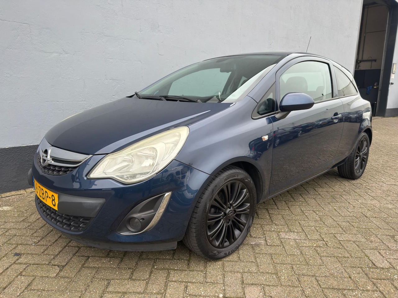 Opel Corsa - 1.4-16V Cosmo 5-Deurs - Navigatie - LMV - AutoWereld.nl