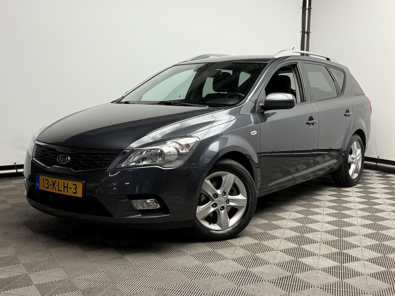 Kia Cee'd - 1.4 CVVT Seven Airco Navi LM16" NL Auto - AutoWereld.nl