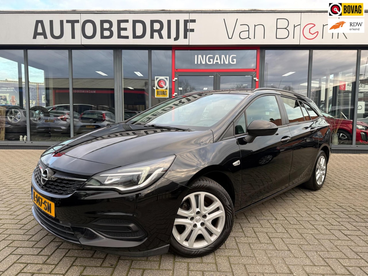 Opel Astra Sports Tourer - 1.2 Edition | Cruise | Trekhaak | PDC - AutoWereld.nl