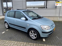 Hyundai Getz - 1.3i Dynamic Sky 1e Eigenaar 103.000 km orgnap , airco & elektr schuif/kanteldak , elektr