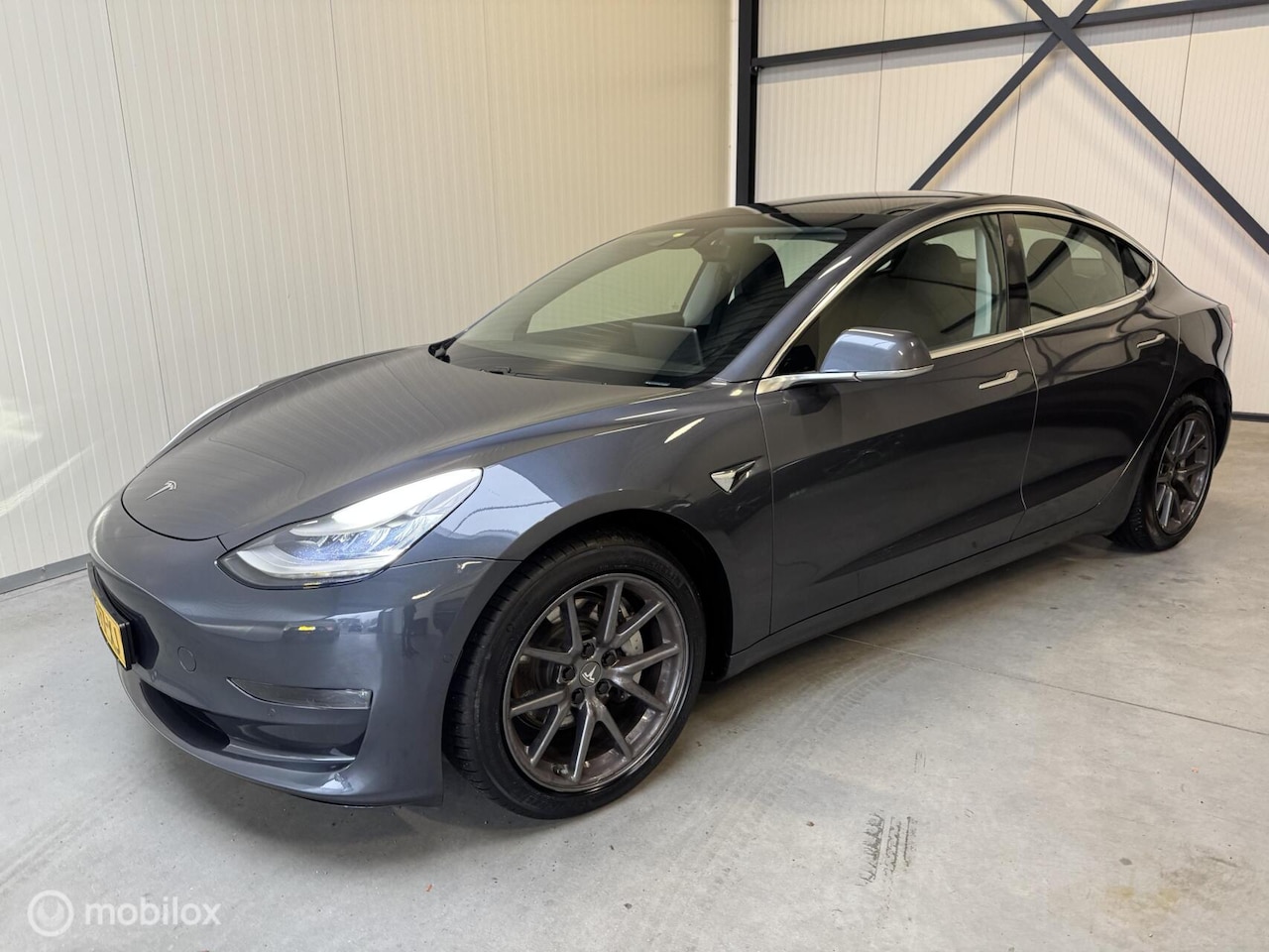 Tesla Model 3 - Long Range RWD Long Range AWD 75 kWh - AutoWereld.nl