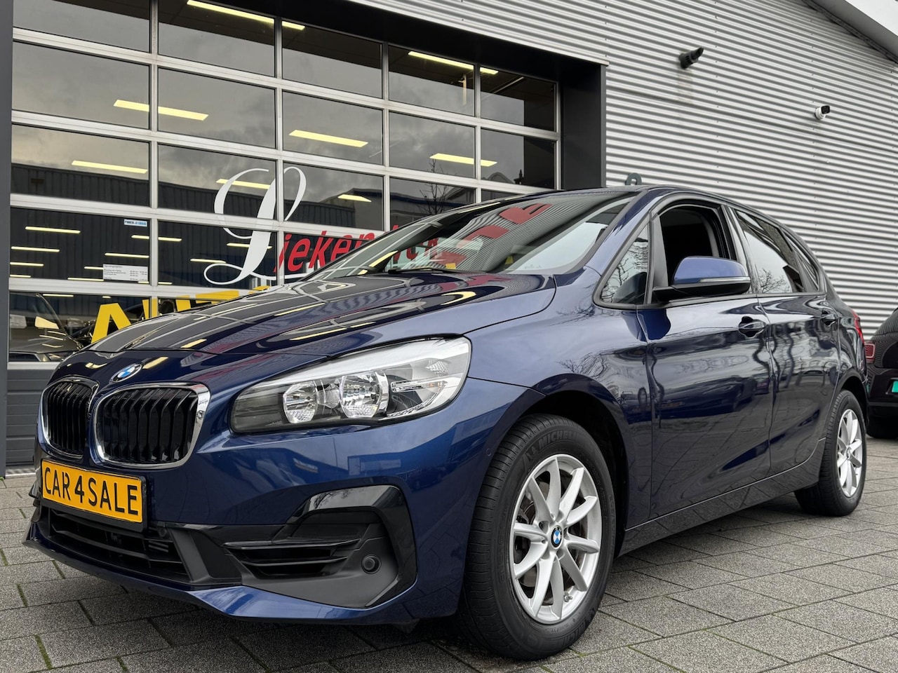 BMW 2-serie Active Tourer - 216i Advantage - Panorama dak I Navigatie I Airco I PDC /Achteruitrij camera I Sport velge - AutoWereld.nl