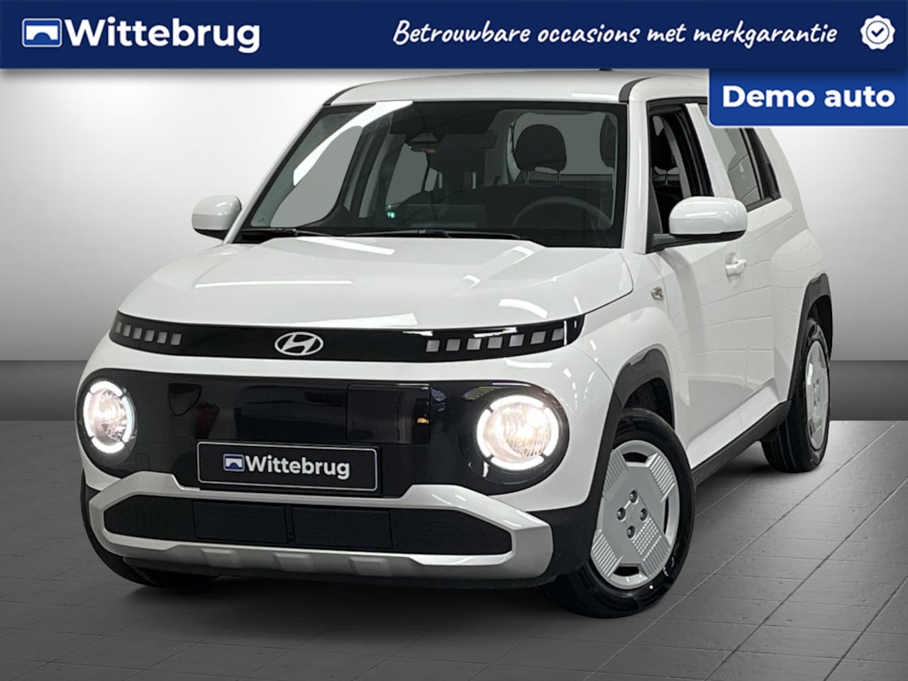 Hyundai Inster - E-Motion 49 kWh DEMOVOORDEEL! | NAVIGATIE | PARKEERCAMERA - AutoWereld.nl