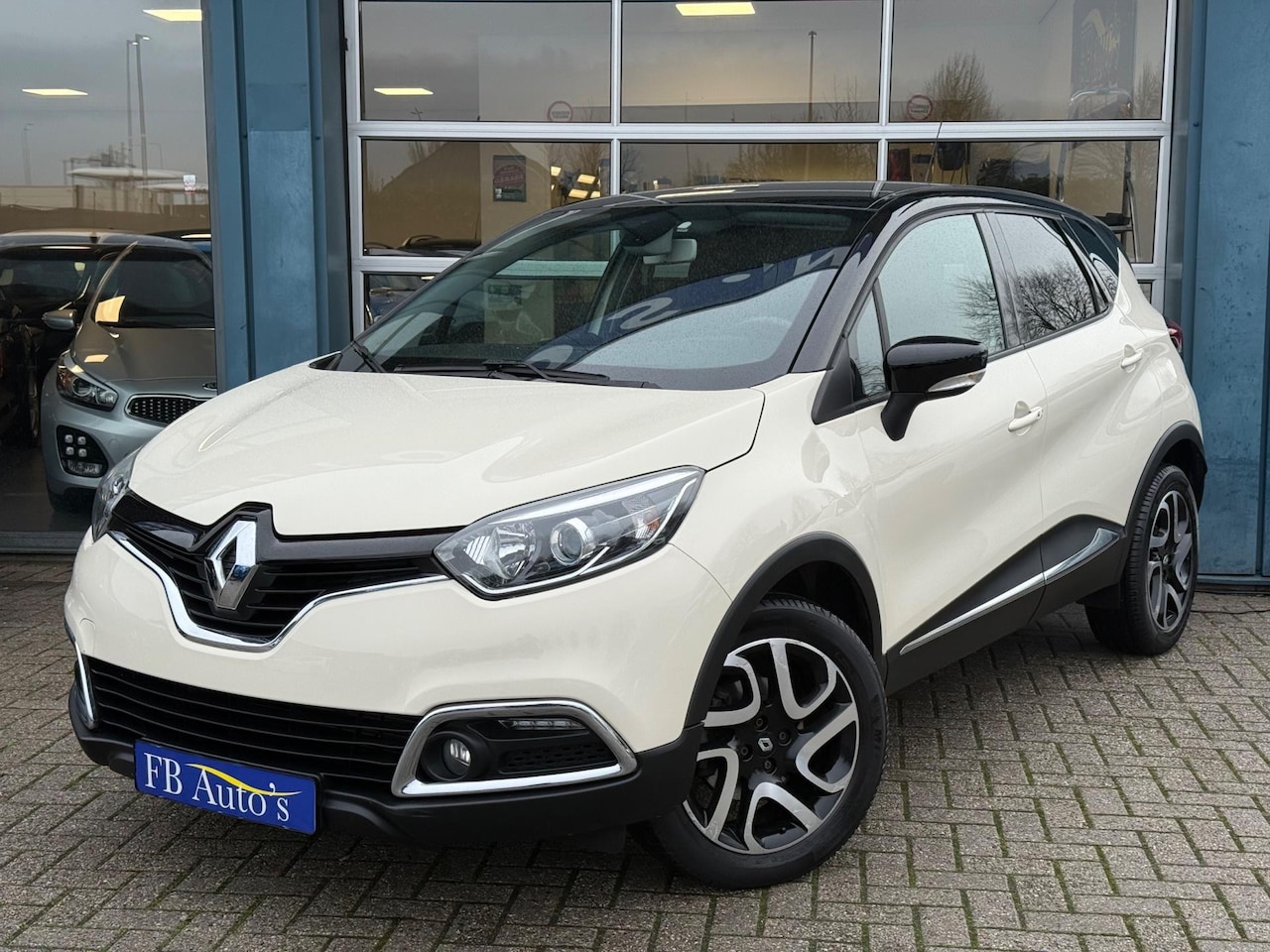 Renault Captur - 1.2 TCe Energy Intens Airco Lmv Navi Camera Cruise - AutoWereld.nl