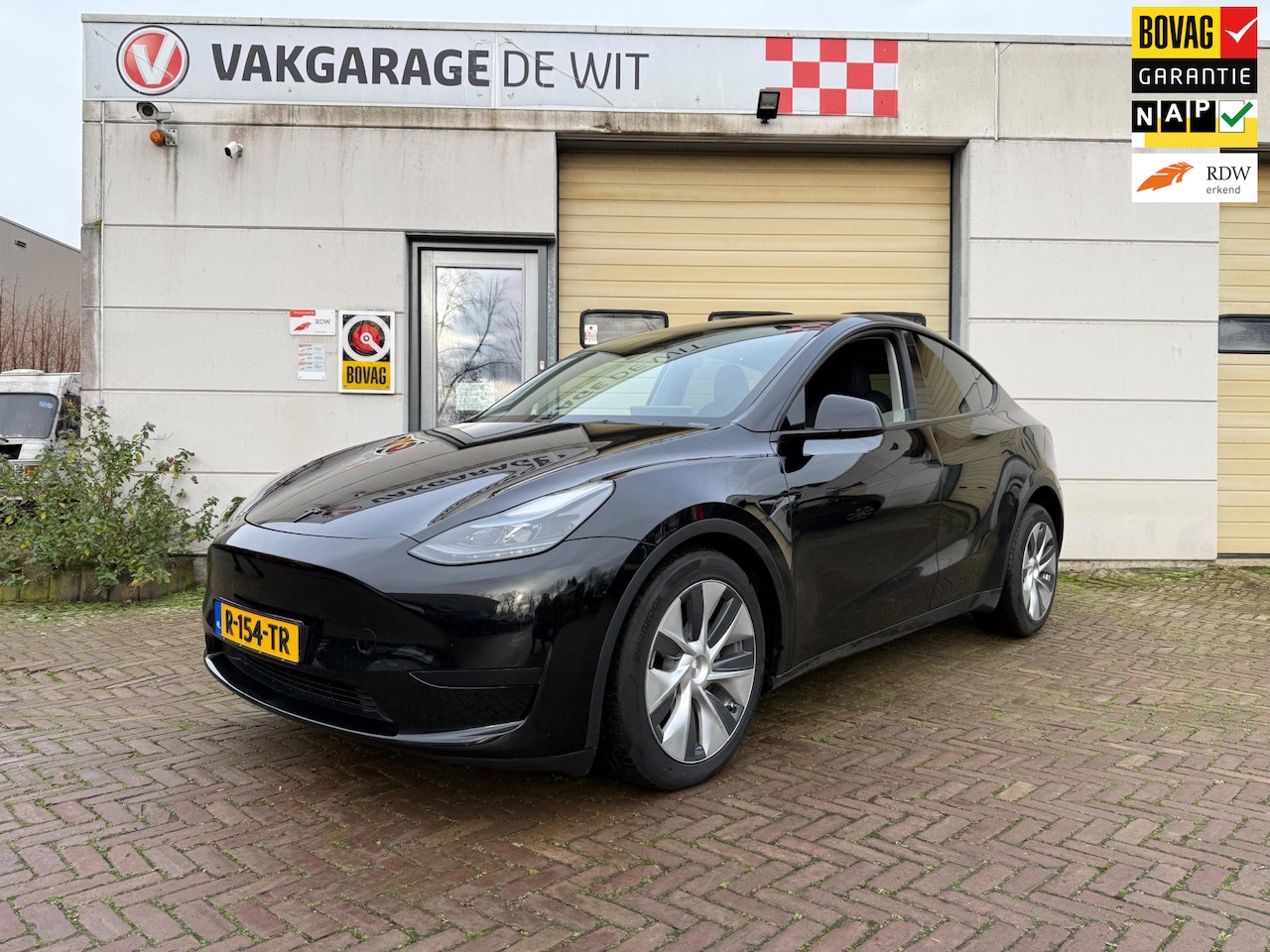 Tesla Model Y - RWD 58 kWh | Trekhaak - AutoWereld.nl