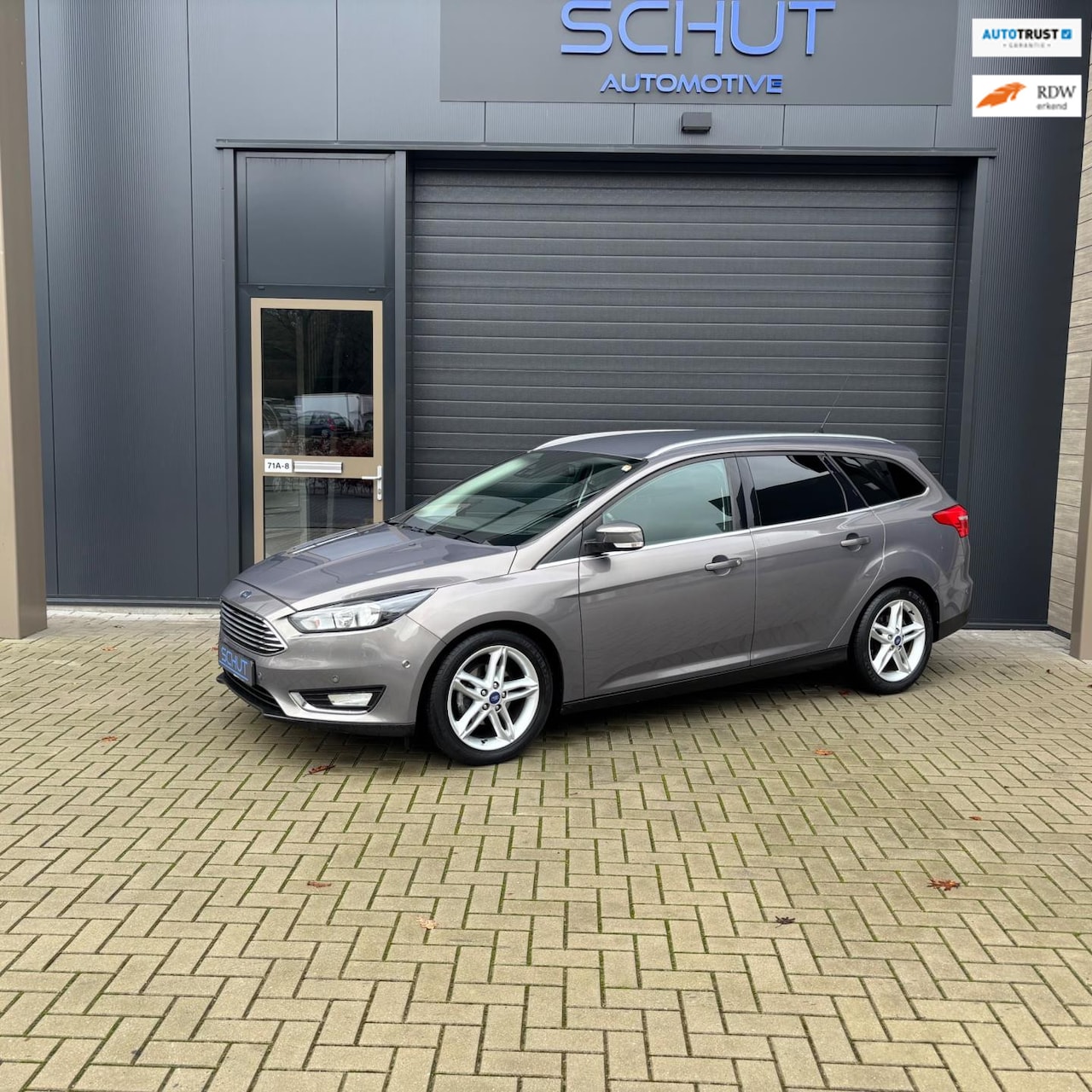 Ford Focus Wagon - 125pk Titanium Edition CLIMA | STOELVERWARMING | TREKHAAK | CRUISE CONTROL | PARKASSIST | - AutoWereld.nl