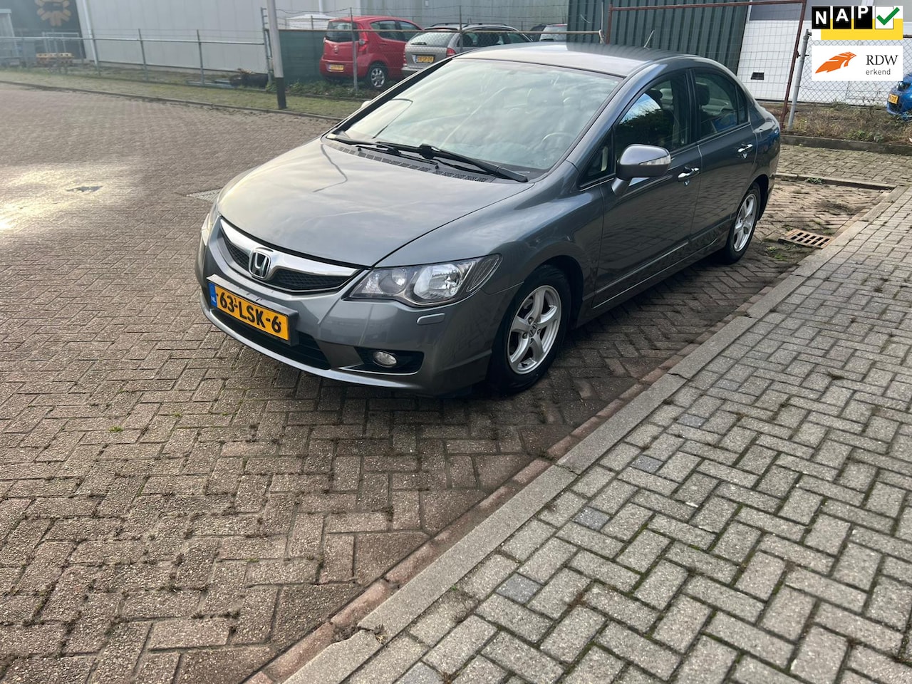 Honda Civic - 1.3 Hybrid Elegance Automaat 1e Eigenaar Cruise Airco Leder Bekleding Pdc Achter - AutoWereld.nl