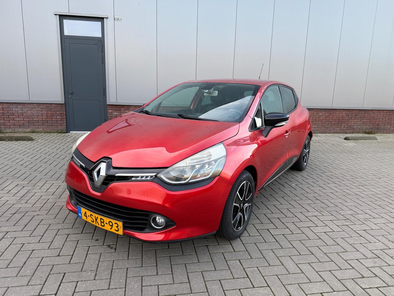 Renault Clio - 1.5 dCi ECO Dynamique Leer Clima Bomvol Rood 2013 - AutoWereld.nl