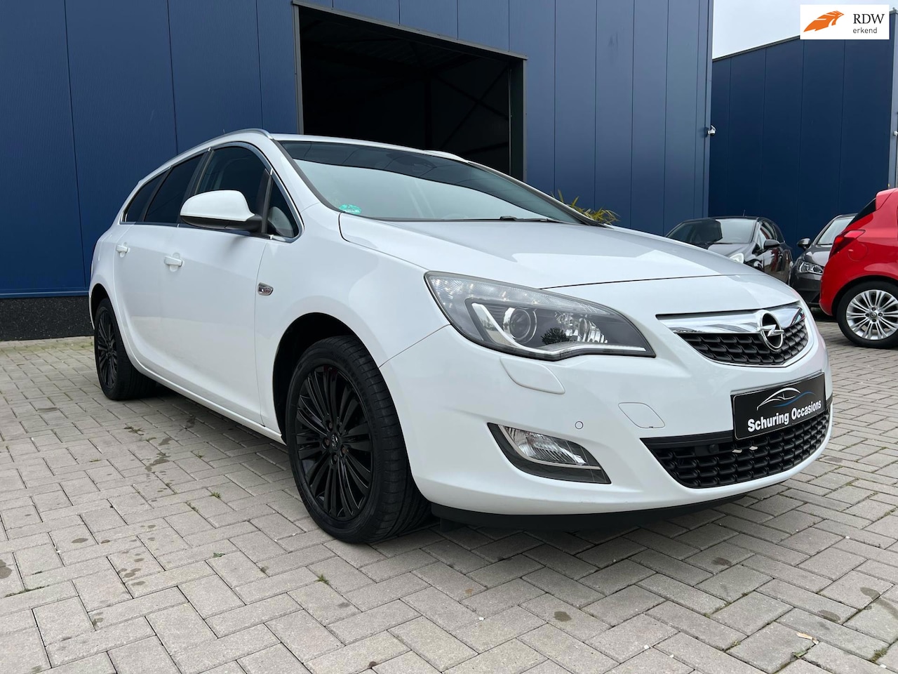 Opel Astra Sports Tourer - 1.4 Turbo Cosmo / CRUISE CONTROL / PDC / CLIMATE CONTROL / LEDER / STOELVERWARMING - AutoWereld.nl