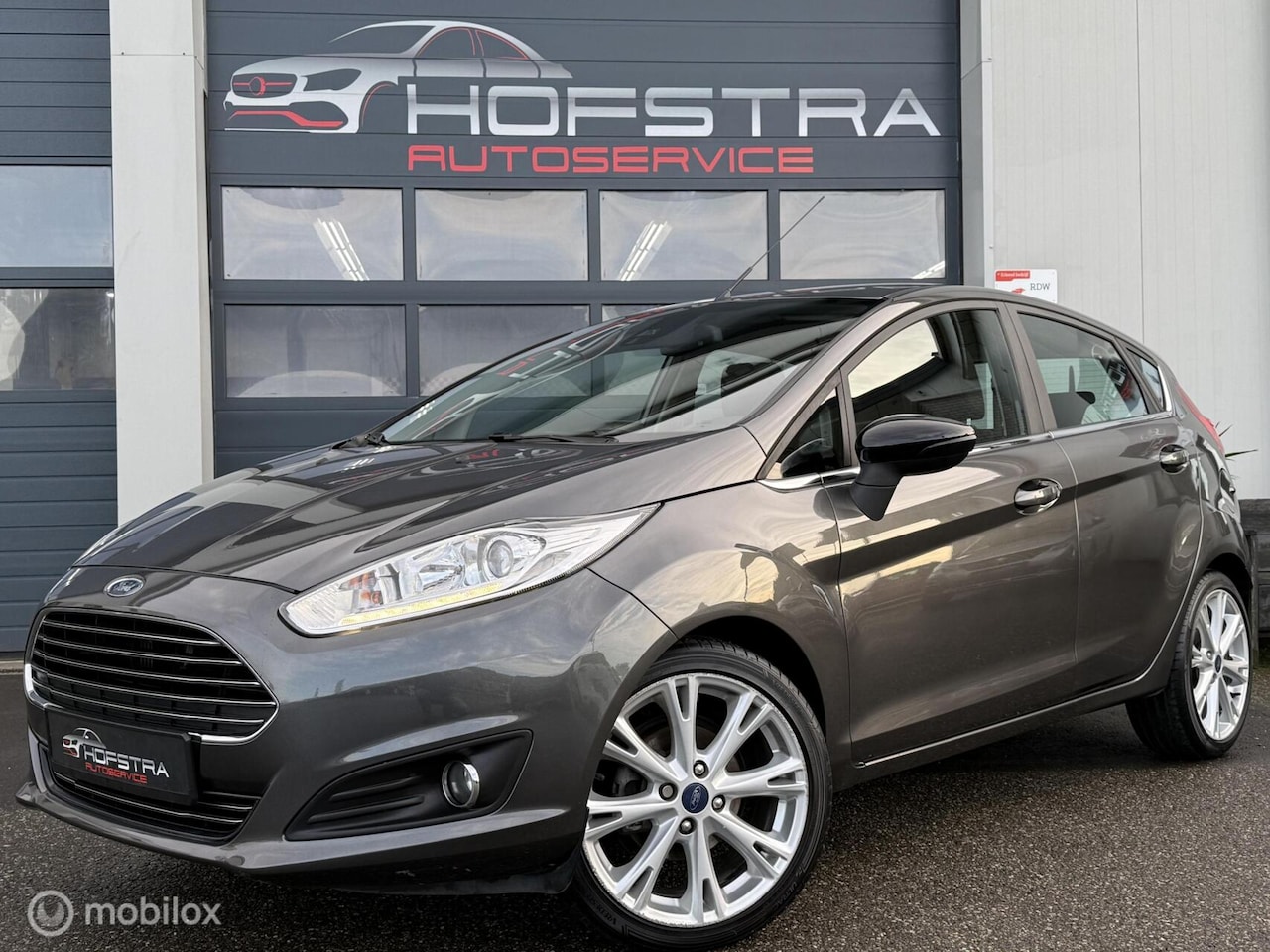 Ford Fiesta - 1.0 EcoBoost Titanium Navi Cruise Trekhk Clima - AutoWereld.nl