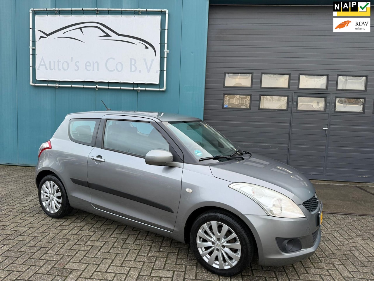 Suzuki Swift - 1.2 Exclusive EASSS Clima Cruise Stoelverw 16"Lm velgen NL Auto NAP Incl nw Apk 01-2027 - AutoWereld.nl
