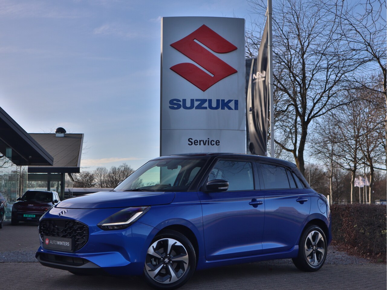 Suzuki Swift - 1.2 Style Smart Hybrid CVT Automaat Navigatie | Camera | Stoelverwarming | Keyless | tot 1 - AutoWereld.nl