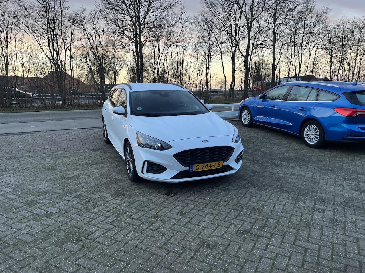 Ford Focus Wagon - 1.0 EcoBoost ST Line Business TREKHAAK ZWARTE HEMEL CRUISE CARPLAY - AutoWereld.nl