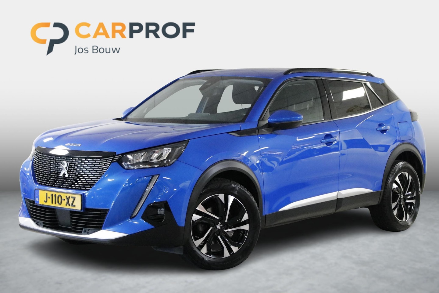 Peugeot 2008 - 1.2 PureTech Blue Lease Allure D-Riem V.V. | Clima | Carplay | DAB | LED | All-Season. - AutoWereld.nl